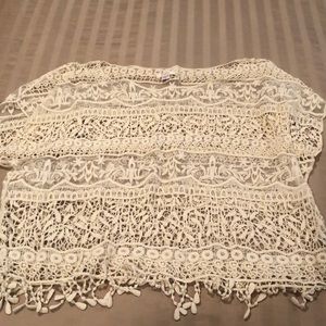 Cream crochet style sheer top with fringe bottom